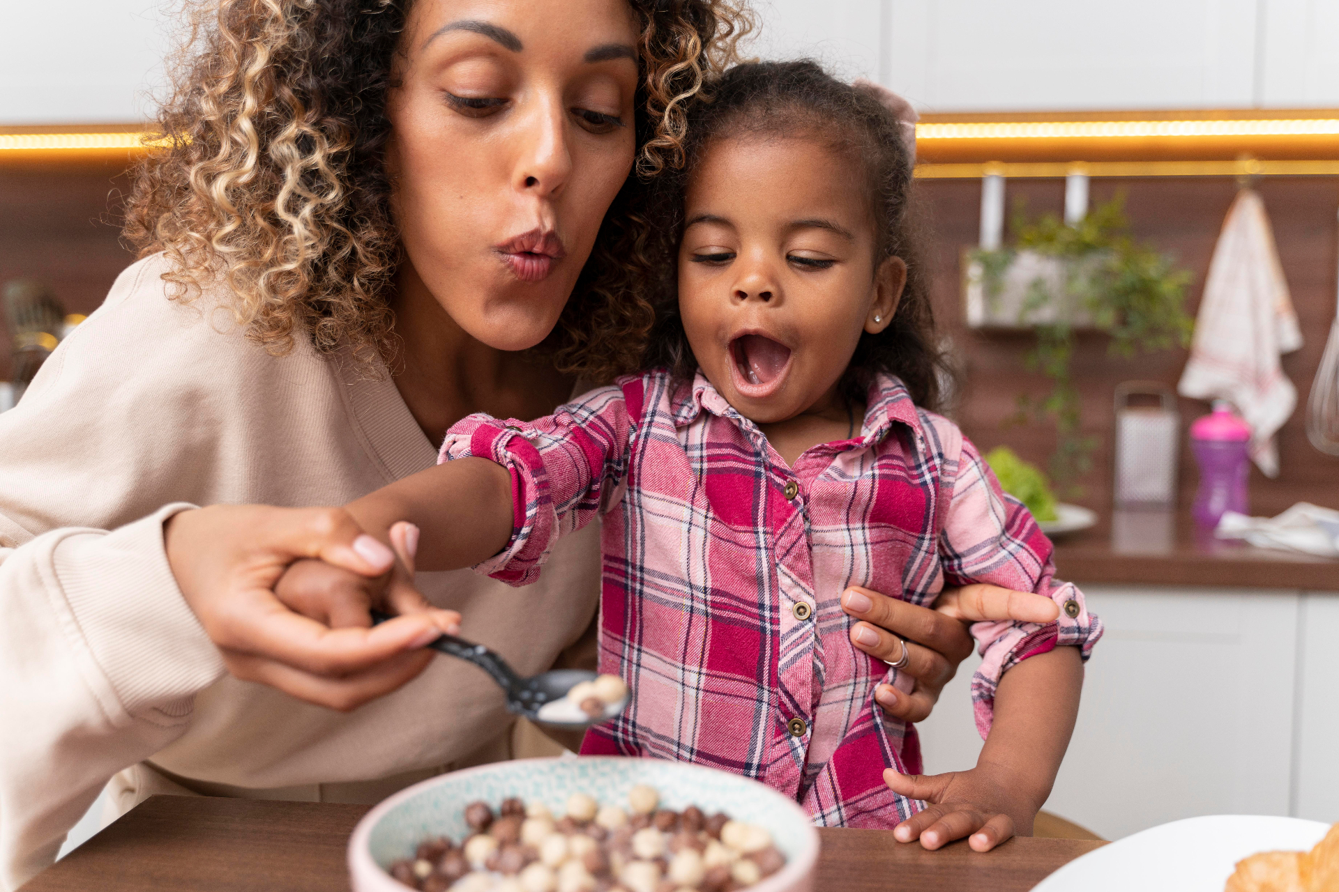 Happy child eating a meal